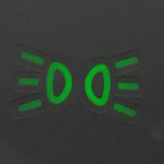 Zielony symbol świateł mijania na ciemnym tle.
