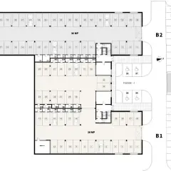 Plan parkingu z numerowanymi miejscami, w tym dla niepełnosprawnych. Nowe wymiary miejsc parkingowych zapewniają komfort.